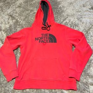 Red North face Hoodie with small stain size small